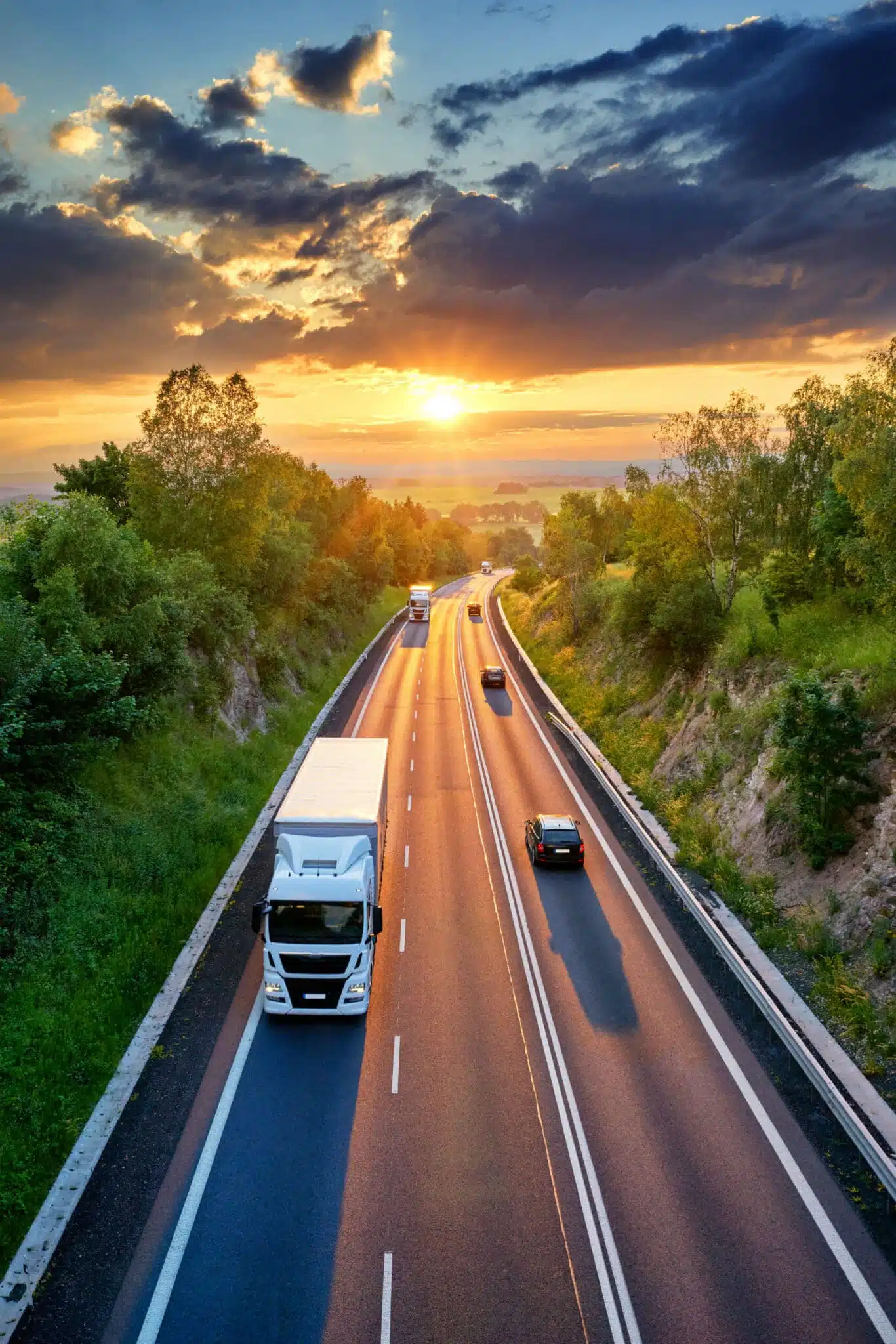 Truck on highway sunset Cargors German Maut toll changes